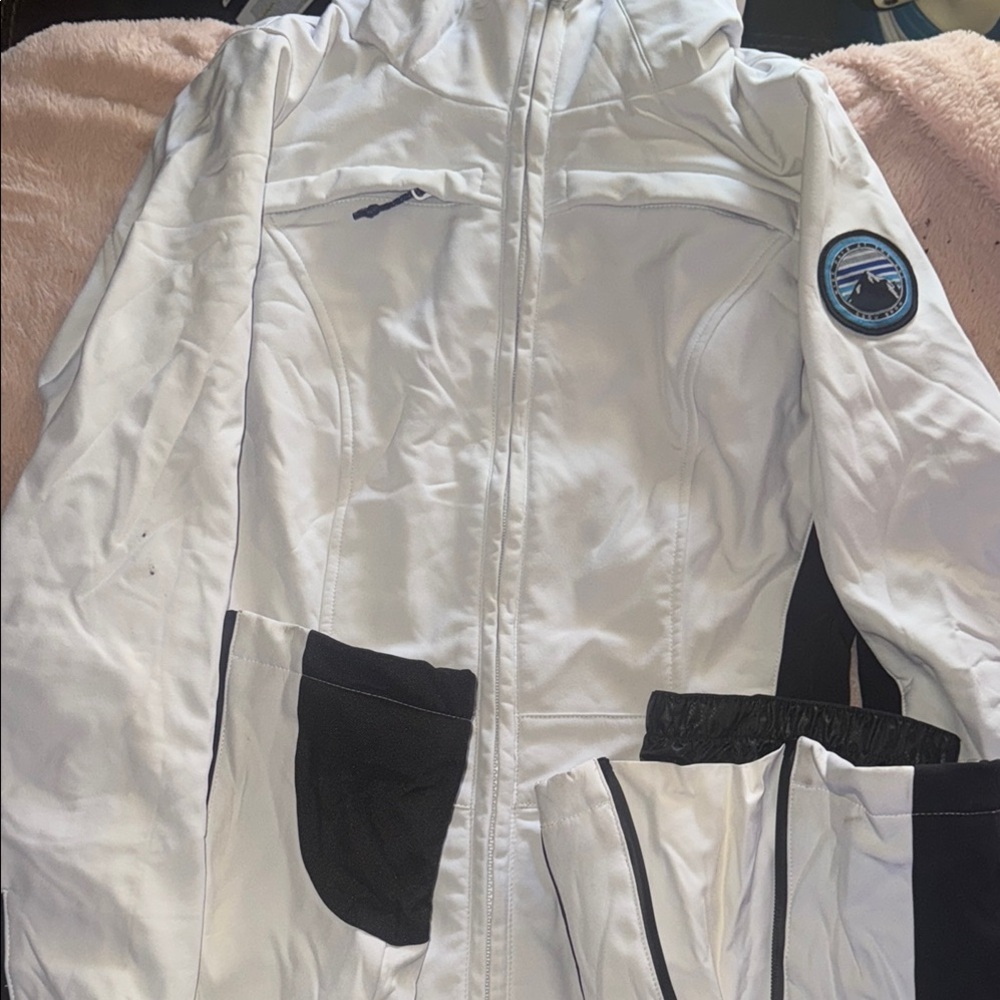 White and Black Glossy Jumpsuit with Zipper Closure